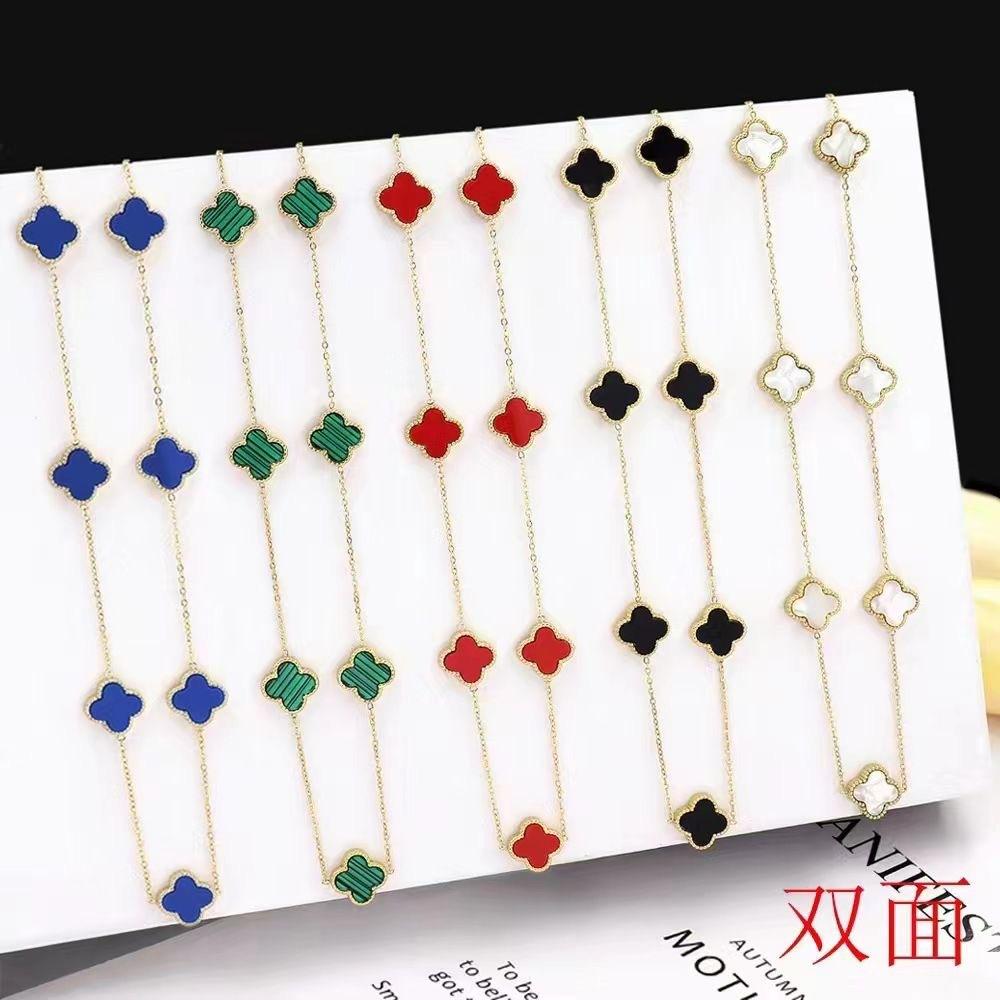 Collier de fleurs de trèfle à quatre feuilles pour la mode féminine, tempérament de luxe léger, chaîne de pull haut de gamme à sept fleurs