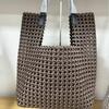 New Large Capacity Hand-Woven Pinwheel Knot Tote Bag with Niche Cutout Design for Mother and Child.