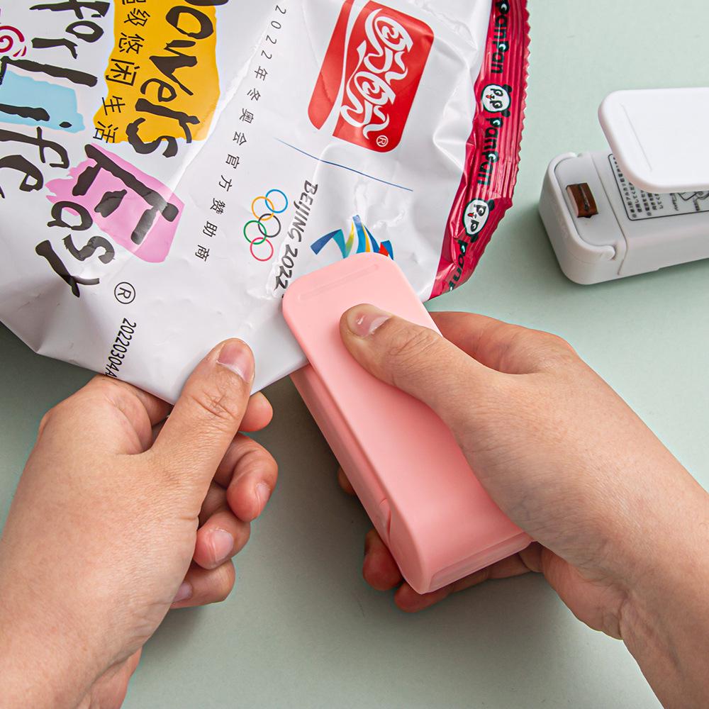 Mini Portable Vacuum Sealer: Compact Household Plastic Bag Sealing Machine for Moisture-Proof Freshness