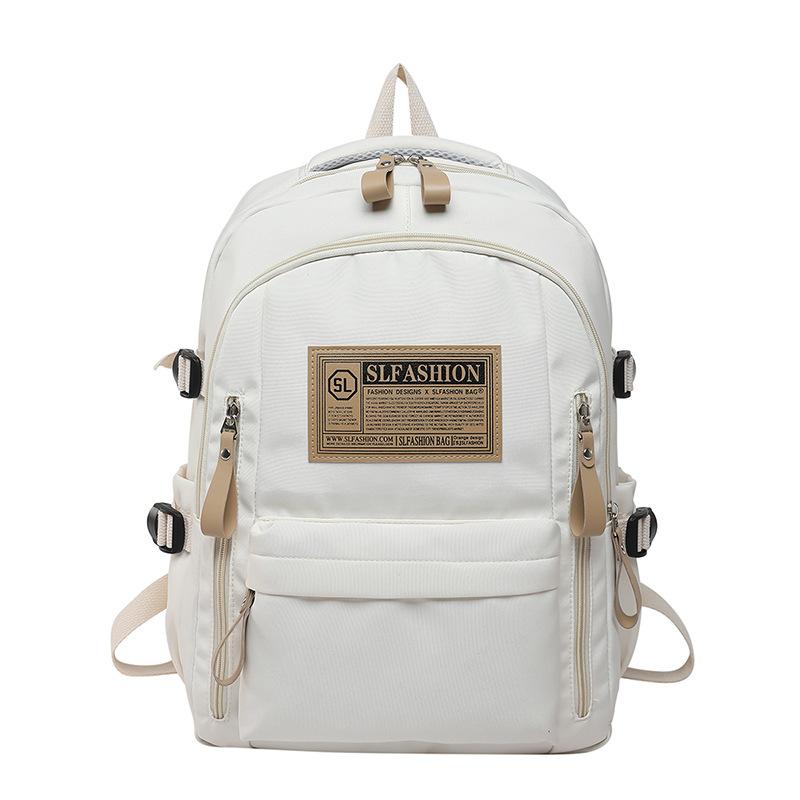 Sac à dos 1011 grande capacité hommes et femmes style loisirs sports sac à dos simple pour élèves du collège version coréenne sac de voyage