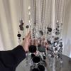 Acrylic Crystal Bead Curtain with Gold and Silver Sequin Pendants for Wedding and Banquet Hall Decor.