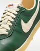 II1259-300 Nike Astro Grabber Leather Fir Sail Muslin (Women's)