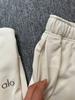 Now Alo Straight-Leg Sweatpants: Unisex Pure Cotton Terry Cloth, Simple Logo, Casual Sportswear.