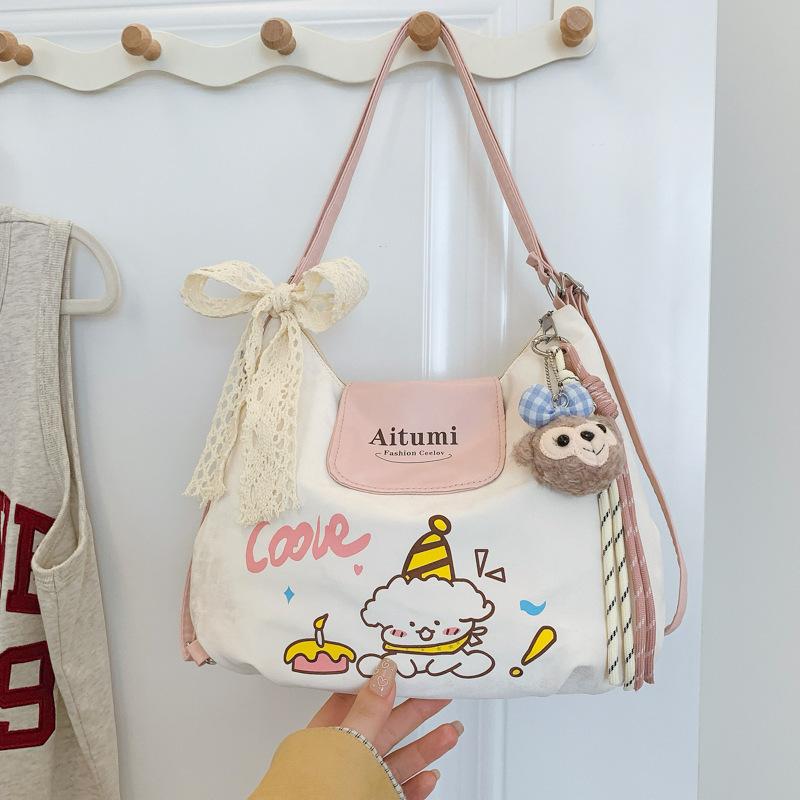 New cute foreign style niche fashion simple commuting texture versatile shoulder bag 2025 summer new women's bag tide