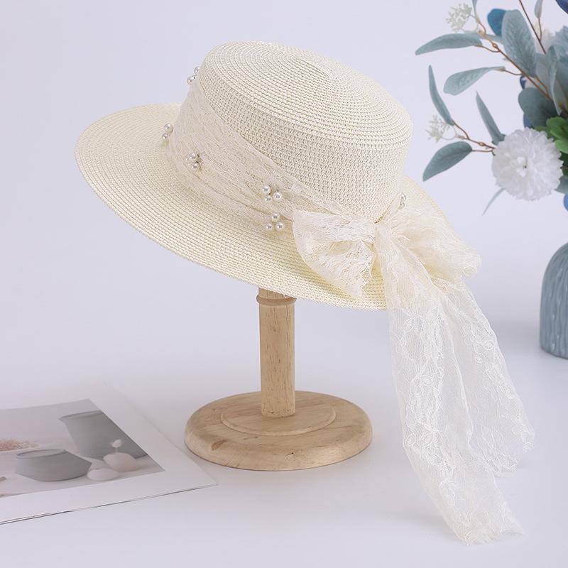 New embroidered lace streamer bow straw hat women's summer flat-brimmed sunscreen sun hat seaside big edge beach hat