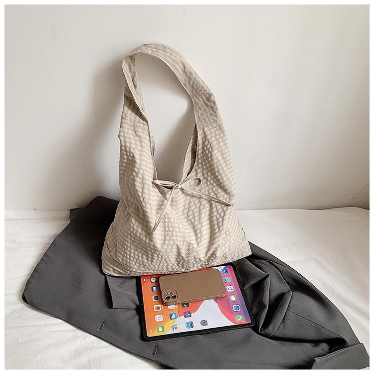 Plaid canvas bag women's large capacity 2025 new versatile casual shoulder armpit bag class commuter tote big bag