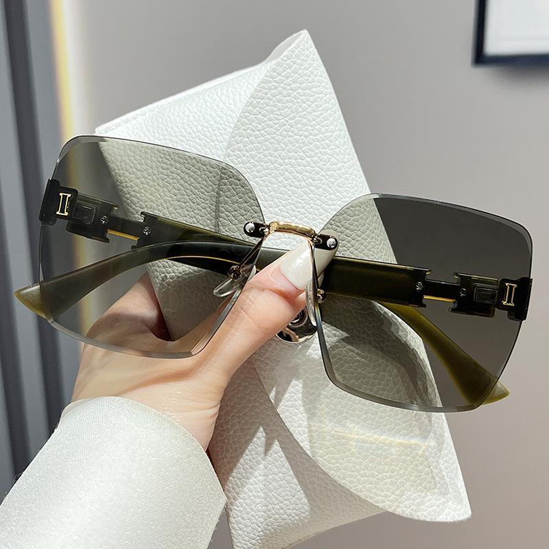 

New Internet celebrity frameless UV protection trend sunshade temperament large frame versatile sunglasses sunglasses women s glasses зелёный