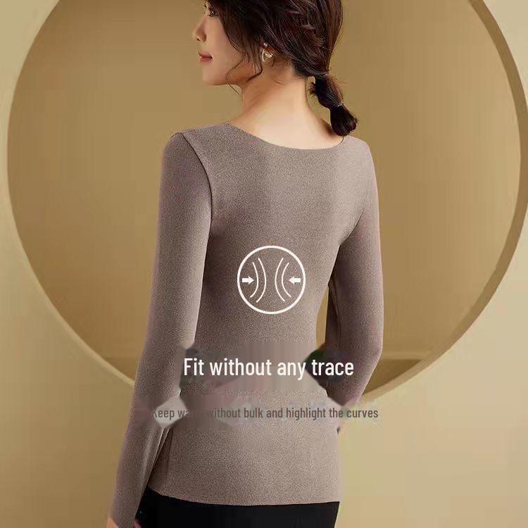 Damen Nahtlose Samt Heizweste: Langärmlig, warm, mit eingebauten Latex-Brustpolstern.