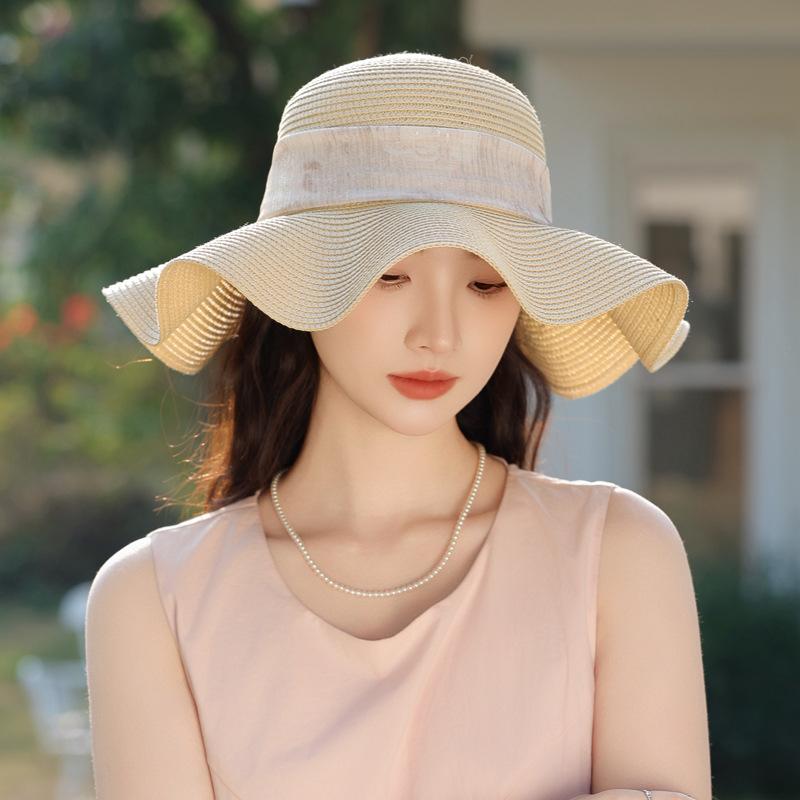 Summer new hat women's outdoor travel Lafite straw hat wave along bow sun hat sun hat