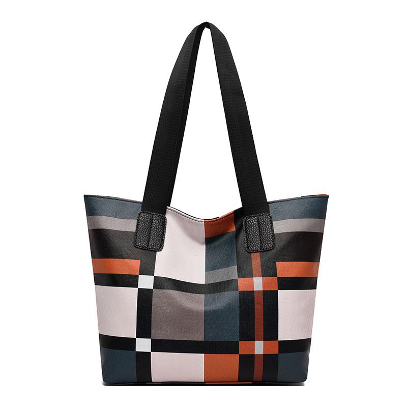 Berühmte Marken-Designer-Handtaschen Damen PU-Leder Top-Handle bolsas Hohe Kapazität Damen-Schultertaschen Lässige Patchwork-Tragetasche