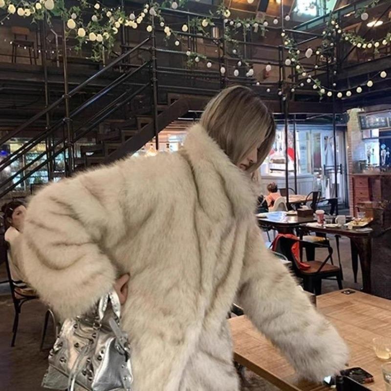 Fur jacket women's autumn and winter thickened warm medium and long imitation fox fur jacket lapel fur