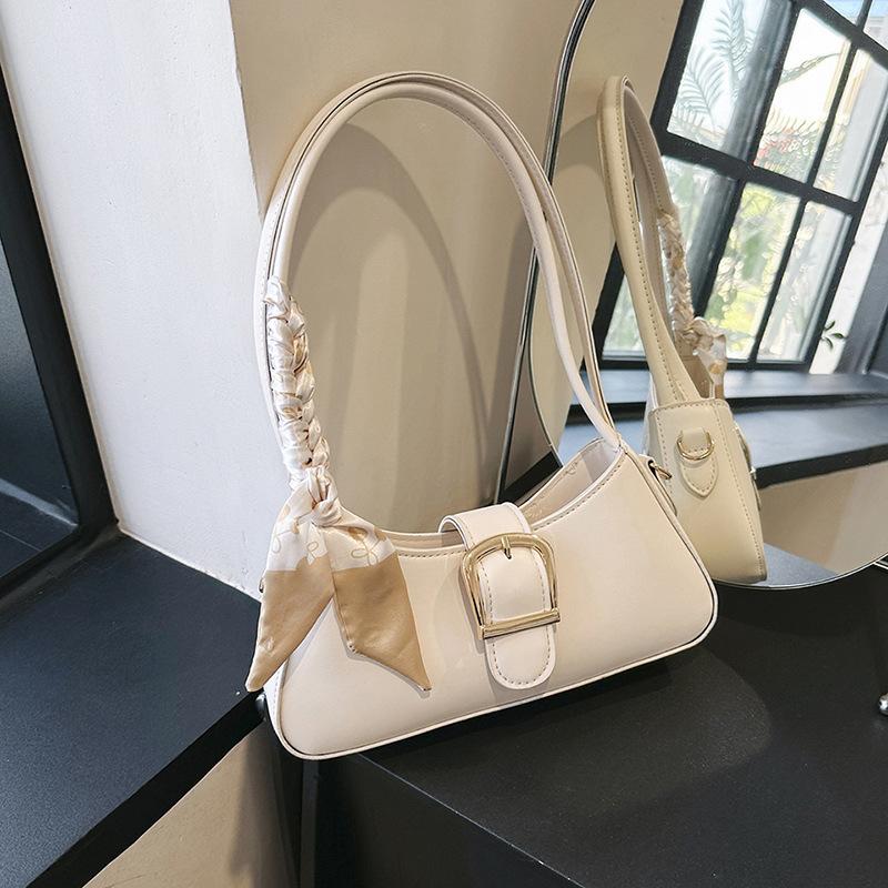 

Премиальная текстура французской нишевой дизайнерской сумки 2024 года, весна, новая корейская версия, модный шелковый шарф, одно плечо, подмышка, маленькая квадратная сумка белый