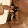 Metal Engraving Crow's Feet Imitation Pearl Chain Blowing In The Wind European and American Women's Earrings