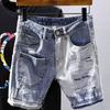 Shorts en jean délavé patchwork bicolore à revers pour homme