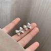 Korean High-end Pearlescent New Trendy Bow Design Cold Wind Stud Earrings