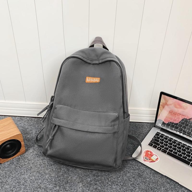 

Trendy brand backpack simple and large capacity male Japanese junior high school student schoolbag Hong Kong style couple travel backpack single pack серый