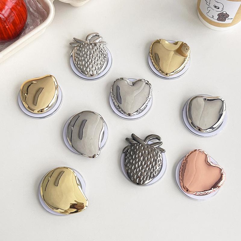 Metal Electroplating Love Strawberry Magnetic Suction Mobile Phone Airbag Bracket Magsafe Retractable Creative Desktop Watching Drama