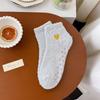 Love embroidered coral fleece short socks autumn and winter thickened warm women's socks solid color dispensing non-slip sleep socks