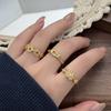 Retro Light Luxury Goldkette Hohl Vierblättriges Kleeblatt Diamantbesetzt Zirkon Kupfer Münze Gürtelschnalle Öffnungsring Nische Stapelring