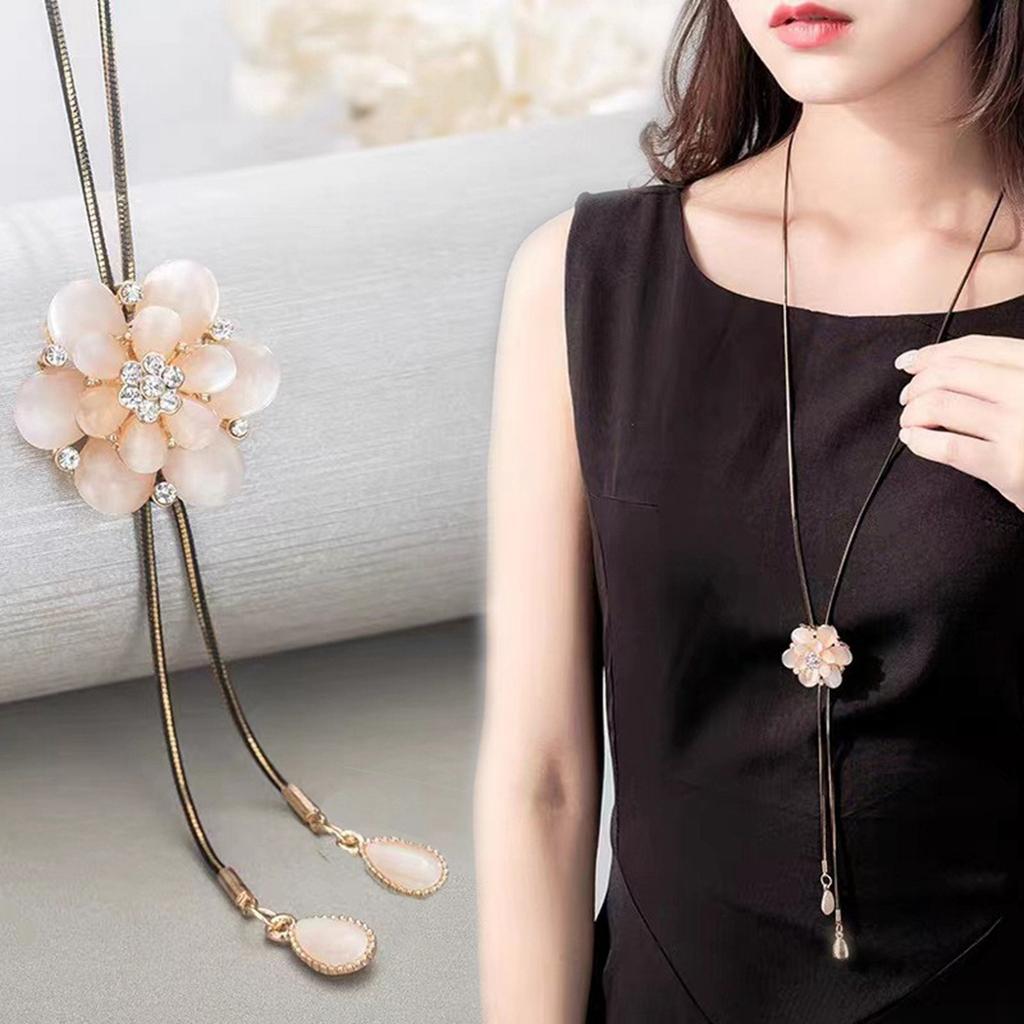 Korean- Adjustable Sweater Chain, High-end Women's Necklace, Fashionable New Cat's Eye Stone Flower Versatile Tassel Pendant.