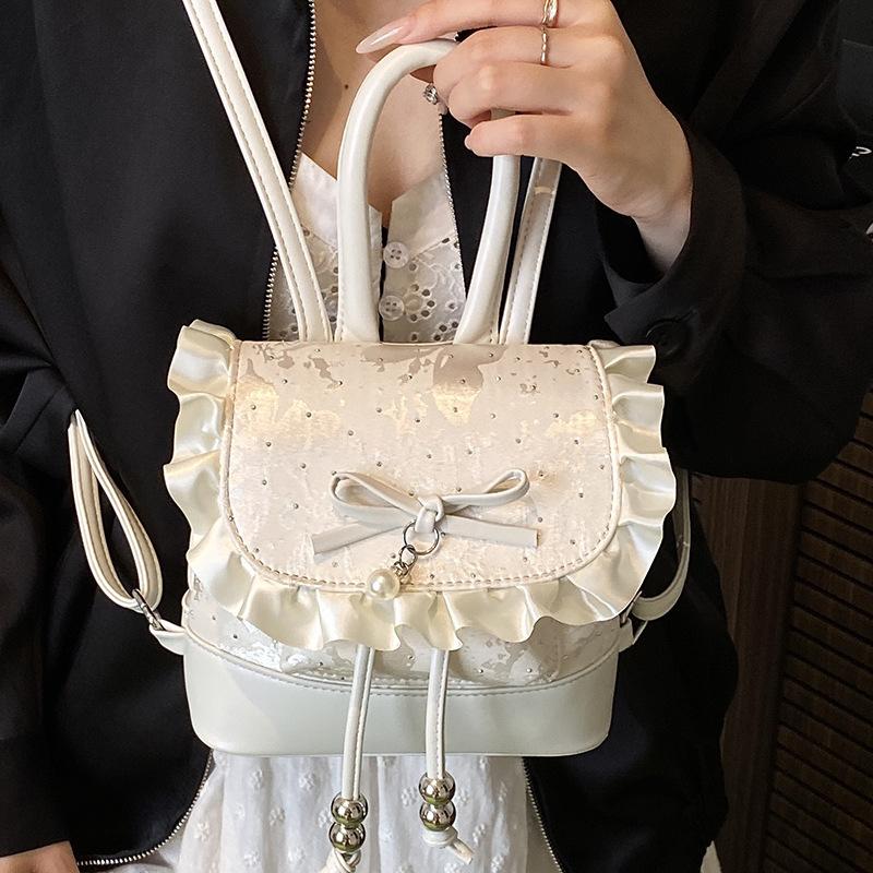 Korean version of fashionable girl style portable small bag 2025 new lace lace high value casual backpack