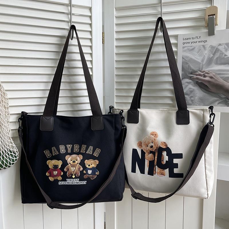 Simple canvas large-capacity bag women's summer new shoulder fashion letter tote bag messenger bag bag