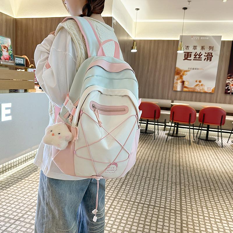 College style backpack women's 2025 new Japanese fashion contrasting color travel backpack girl junior high school student school bag