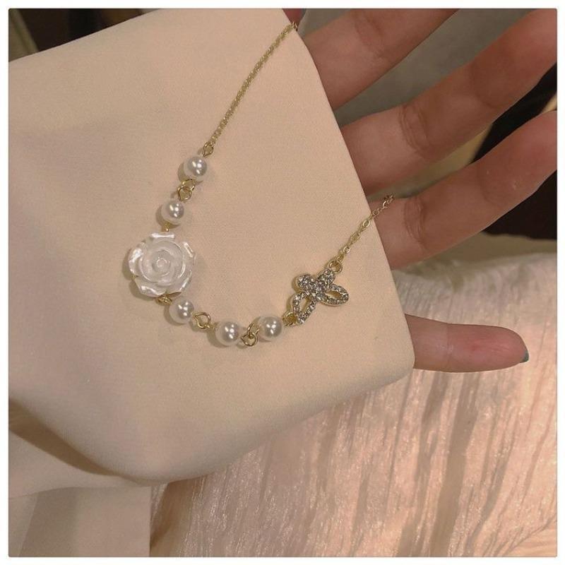 Ретро белая роза ожерелье женское нишевый дизайн чувство легкая роскошь бант ключица цепь шейная цепь аксессуары