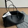 Schwarze weiche Leder-Tote-Bag mit großem Fassungsvermögen für Damen, leichter Luxus, Nische, High-End-Umhängetasche