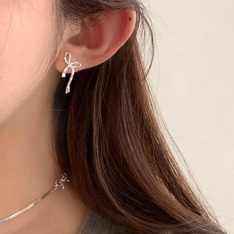 Mašličkové duté náušnice s puzetkou dámské sladká dívka srdce výklenkový design lehký luxus high-end náušnice