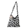 2025 Early Spring New Large Capacity Plush Trend Cow Pattern Personality Student Class Shoulder Bag Female Design Sense