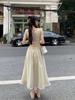 French hollow waist hanging neck suspender dress women's summer lace-up waist thin holiday style seaside fringed long dress
