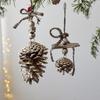 NUCHI Christmas Pine Cone String Ornaments & Wooden Bell Wind Chimes Decorations