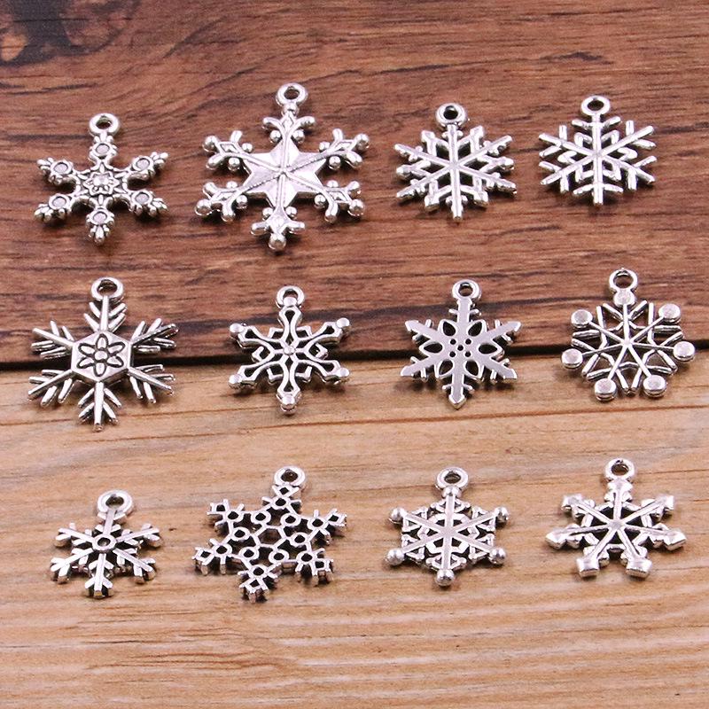 

12 DIY Zinc Alloy Christmas Snowflake Charms for Jewelry, Handbags, Phones, and Necklaces