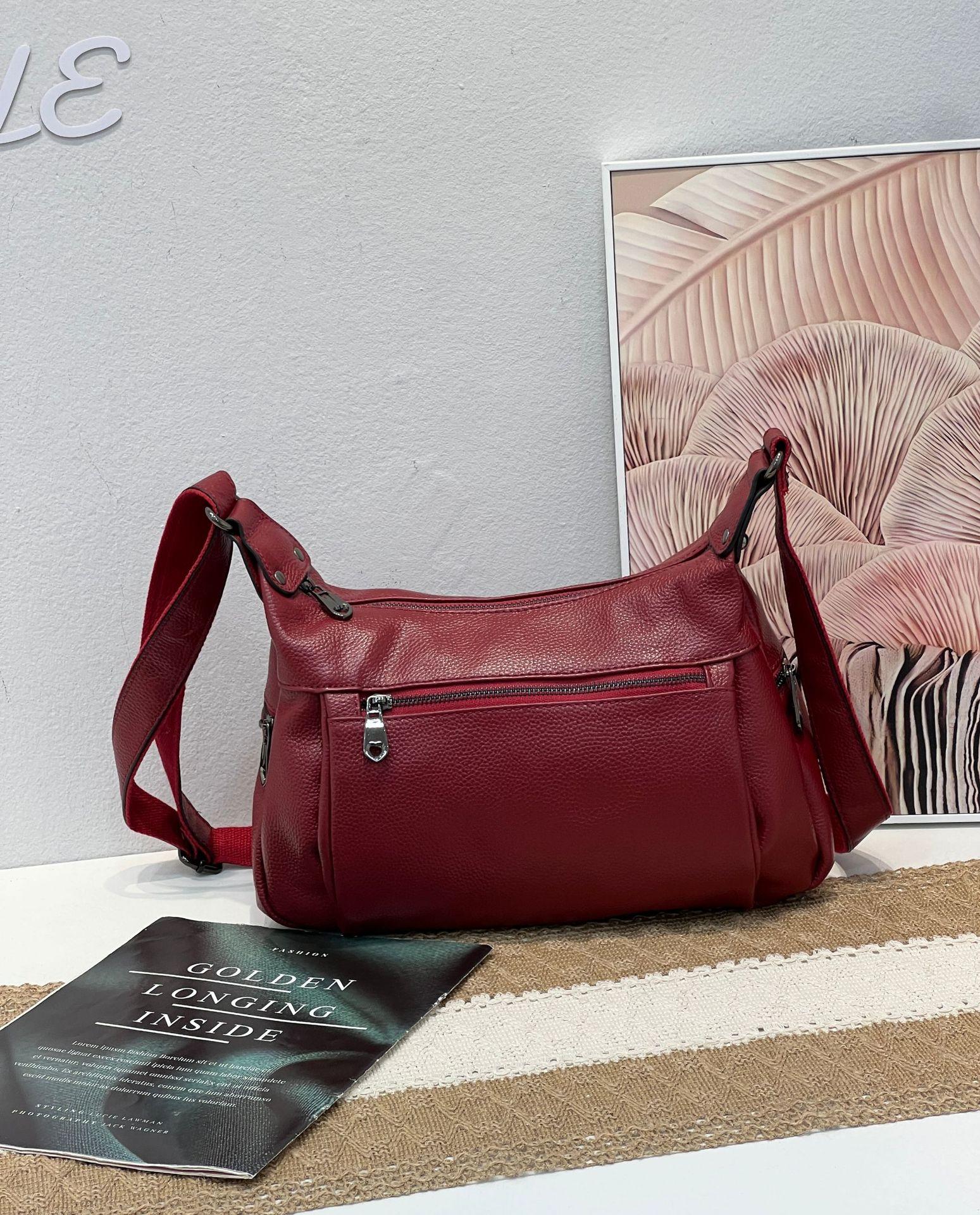 

Dropped Pattern First Layer Cowhide Women Single Shoulder Crossbody Simple Multi-Compartment Dumpling Bag Large Capacity Aunt Mother Bag бордовый