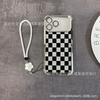 Black plaid applies to iPhone17 mobile phone case, four corners anti-drop airbag 16promax portable rope 15 protective case.
