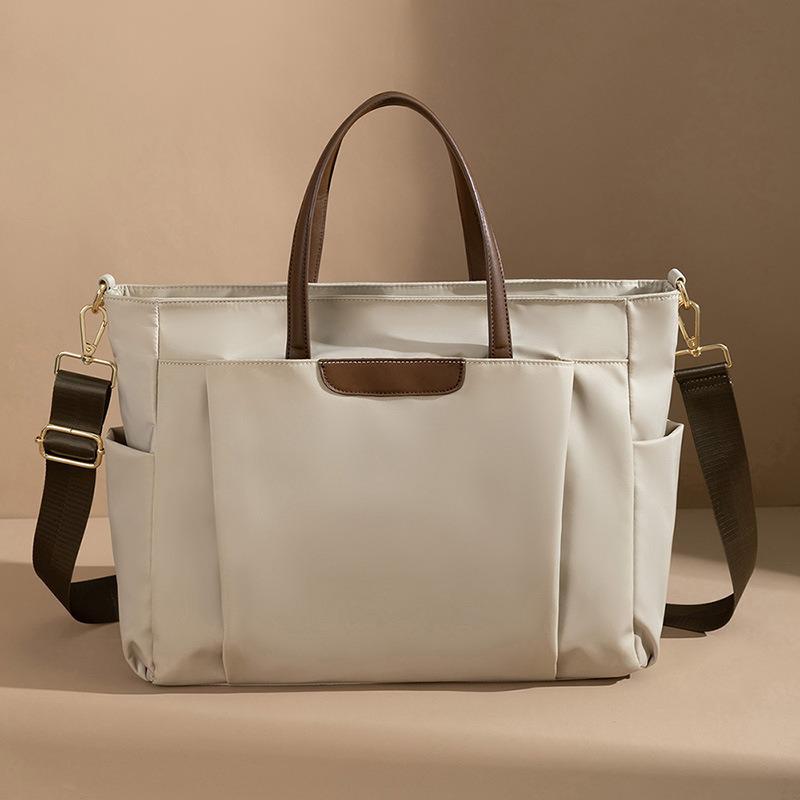 16-Inch Women's Laptop Handbag: Large Capacity, Thickened Briefcase for Business Travel and Commuting.