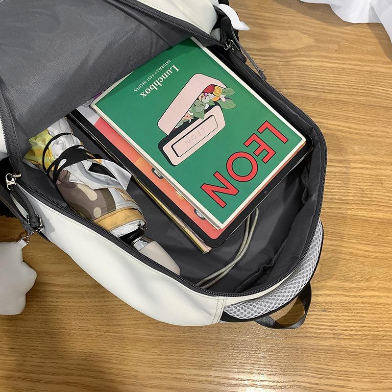 Korean Version Ins New Highvalue Collegestyle Contrasting Backpack, Casual and Lightweight Largecapacity Backpack for Junior High School Students