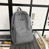 Backpack women's new Korean version Harajuku college student schoolbag student backpack simple solid color large capacity backpack