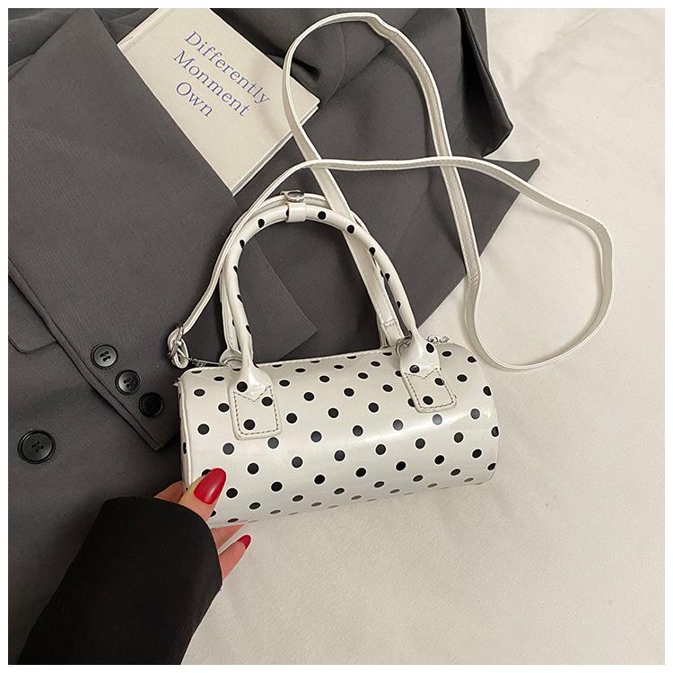 Niche design bag women's 2025 new summer shoulder messenger bag polka dot portable cylinder bag