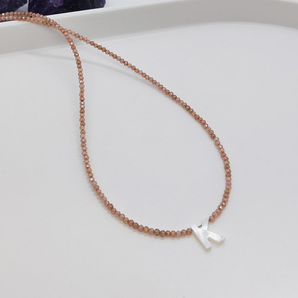 Elegant 2m Zircon Beaded Clavicle Chain: 26-Letter Deep Sea Shell Necklace for Women.