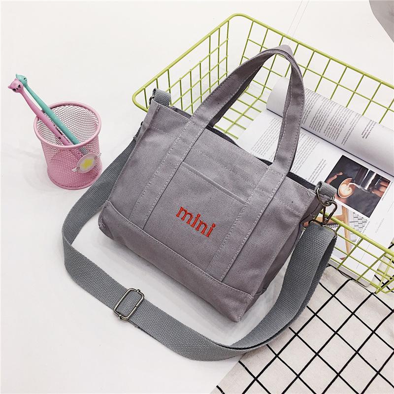 Fashion 2019 new dual-purpose canvas bag, fresh and casual simple letter student shoulder oblique span bag