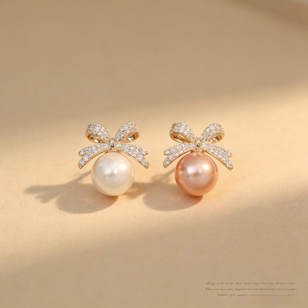 Fashionable Bow-shaped Pearl Stud Earrings New Hit Item Light Luxury High-end Niche Style Small-sized Sea Shell Pearl Earrings
