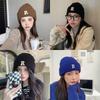 Hat winter female high-value round face student versatile cold-proof warm face small knitted wool hat