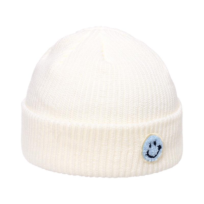 Autumn and winter wool hat male trend Japanese and Korean yuppie knitted warm smiley face sticker landlord hat candy color melon fur hat female