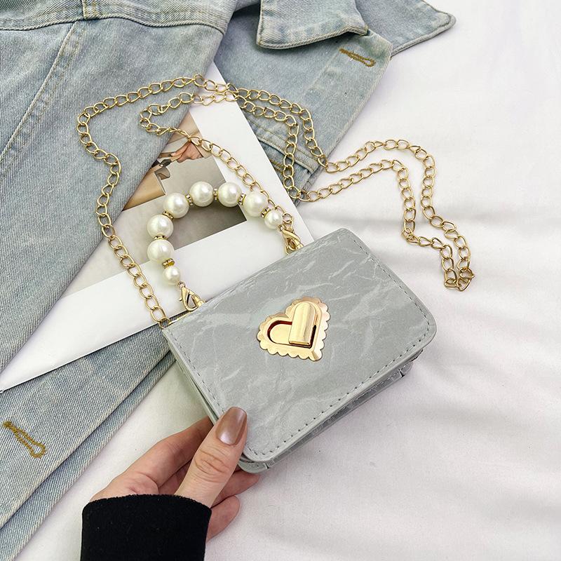 

2024 new niche design foreign style simple personality small square bag trendy fashion beautiful chain shoulder handbag срібний
