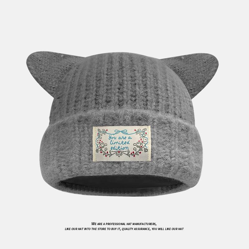 Japanische Süße Weiche und Wachsige Flauschige Gestrickte Mütze für Damen im Herbst und Winter mit Aufnäher Warme Katzenohren und Kopfumwickelnd Persönlichkeit Wollmütze
