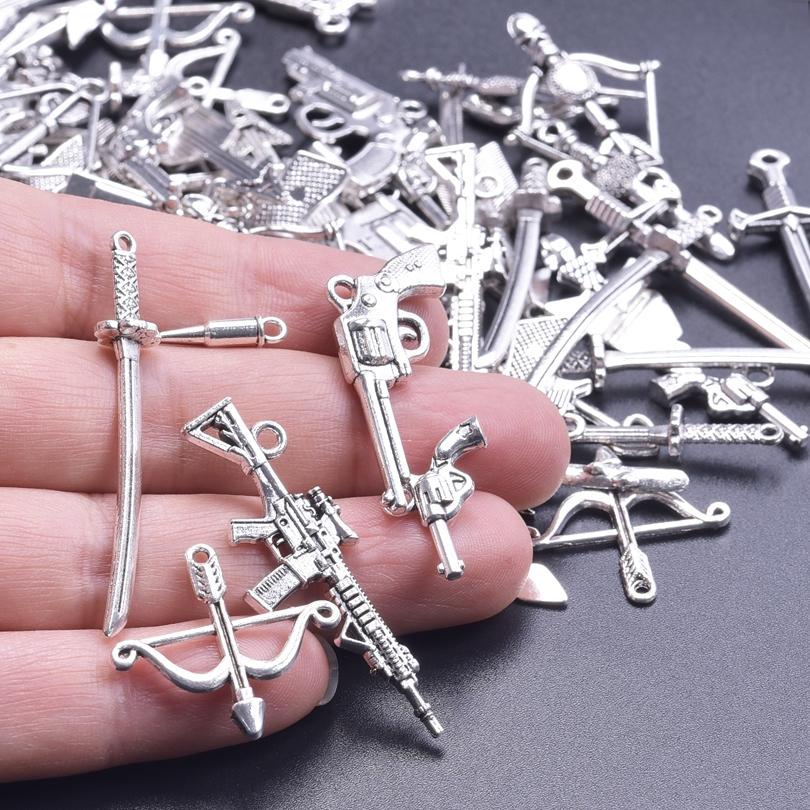 102030Pcslot Silver Color Metal Weapon Sword Gun Charms For Jewelry Making Supplies Random Mix Handmade Bow And Arrow Pendant