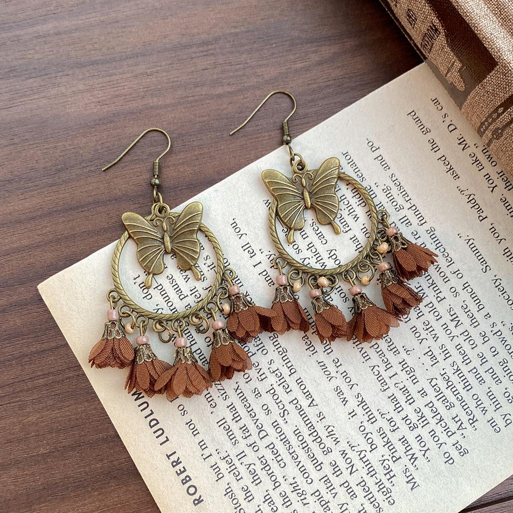 Kolczyki z zawieszką w kształcie muszli w stylu retro etnicznym, modne, z osobowością, niszowe, temperamentne, kolczyki o wykwintnym designie