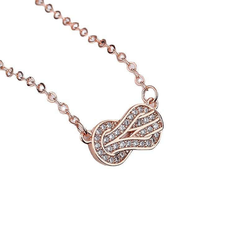 Korean version of fashion temperament rotating peanut bean necklace women's niche design chain versatile jewelry